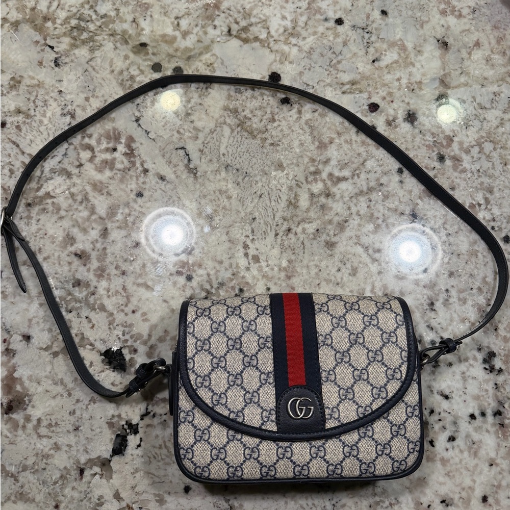 Ophidia flap shoulder bag in blue